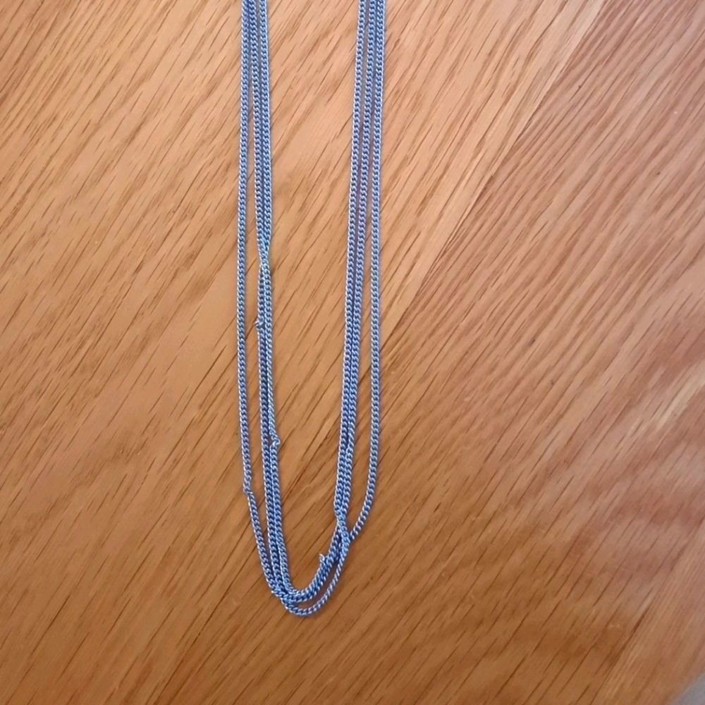 Silver necklace with 3 chains